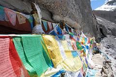 
I did a full circle from where I stood to admire the panorama (11:36). Prayer flags drape some of the 13 Golden Chortens on Mount Kailash South Face in Saptarishi Cave. This view leads to the Nandi Pass with just a bit of Nandi on the right.

